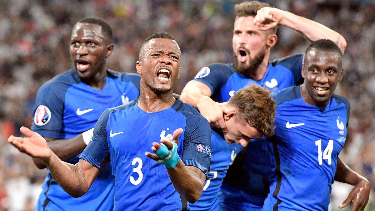 The France players celebrate after Antoine Griezmann scored the first goal for his team. (Photo: AP)