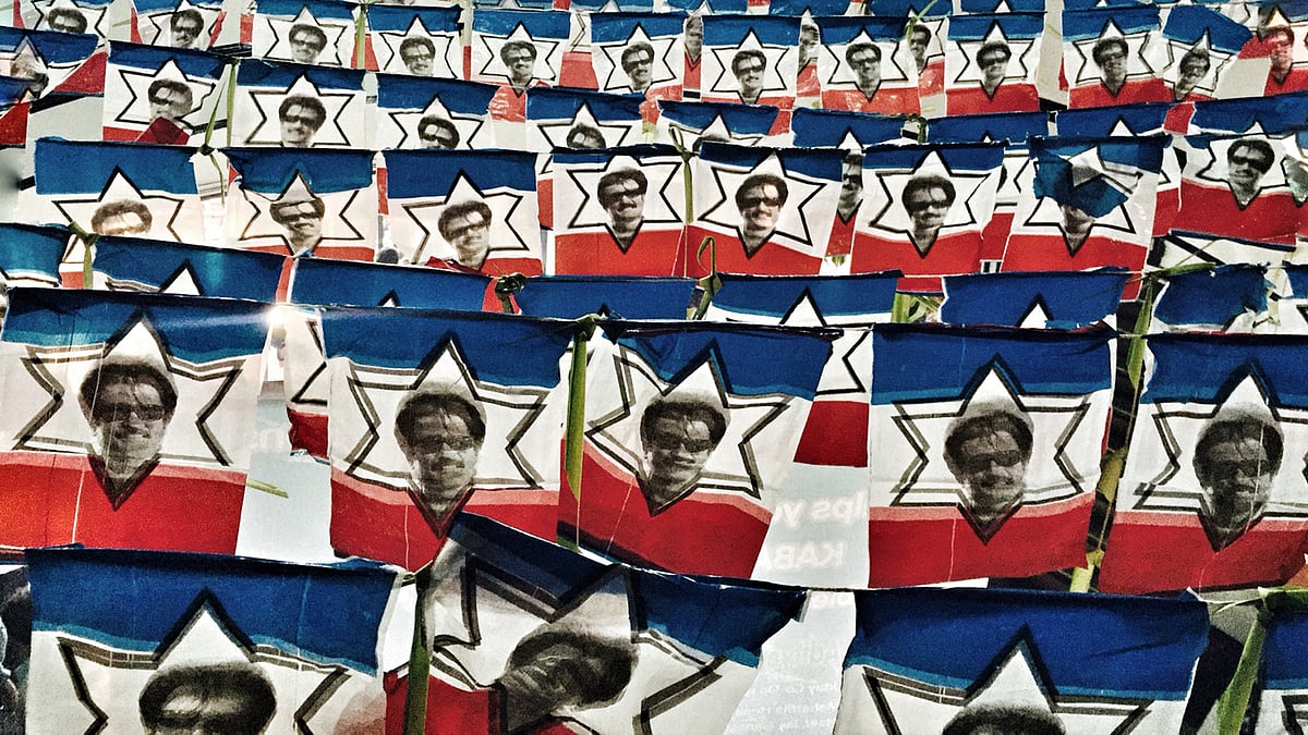 <div class="paragraphs"><p>Hundreds of Rajinikanth flags lined the cinema halls, with a hundred more being waved inside and outside it. </p></div>