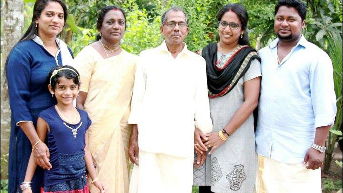 Vikraman and Anitha with daughters Aathira and Ashley. (Photo Courtesy:<i> The News Minute)</i>