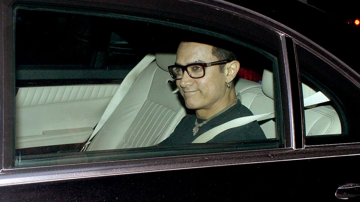 Why is Aamir Khan wearing jewellery? (Photo: Yogen Shah)