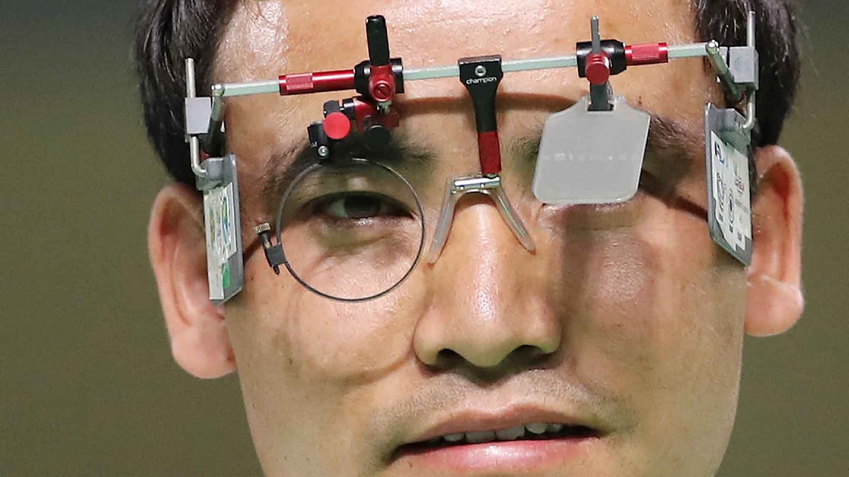 Jitu Rai of India prepares to compete the men’s 10-meter air pistol finals at Olympic Shooting Centre. (Photo: AP)