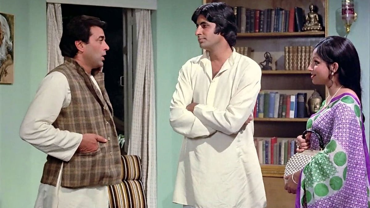 Dharmendra, Amitabh Bachchan and Sharmila Tagore in Hrishikesh Mukherjee’s <i>Chupke Chupke. </i>