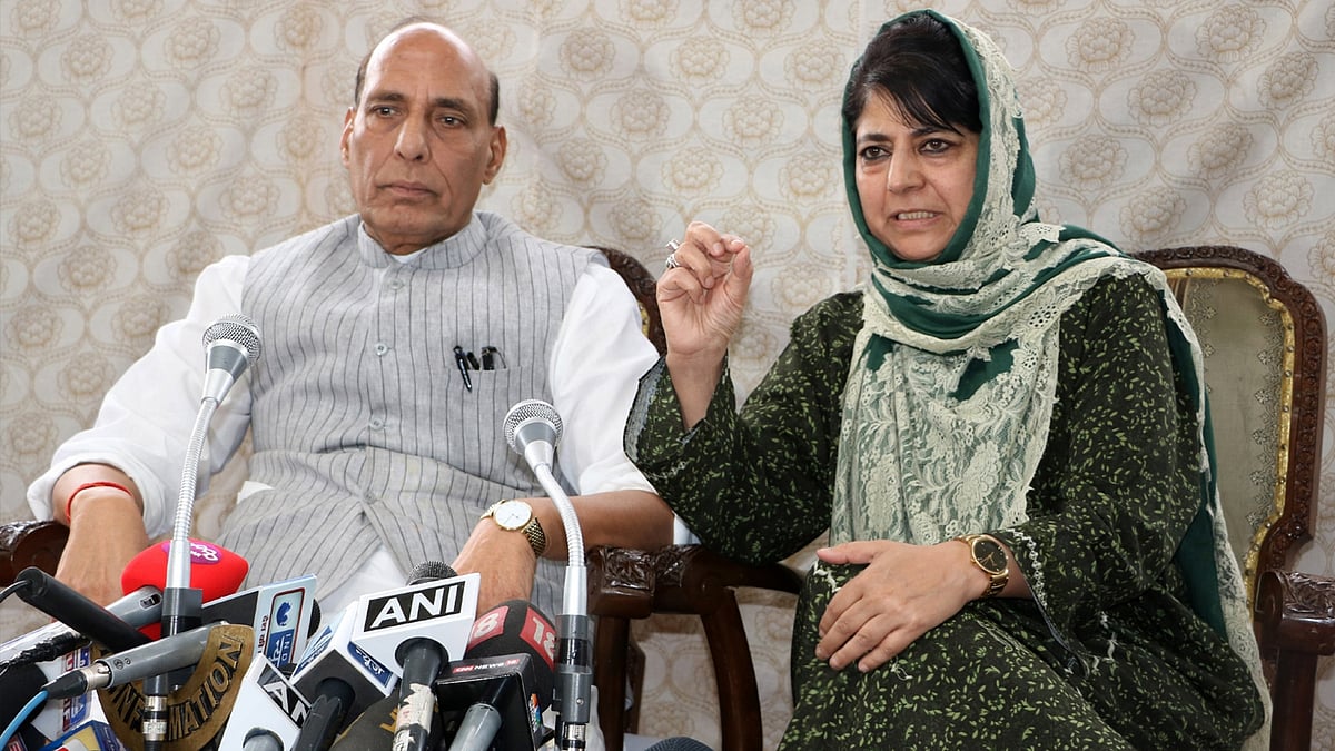 Union Home Minister Rajnath Singh and Jammu and Kashmir Chief Minister Mehbooba Mufti address a press conference in Srinagar on Thursday. (Photo: IANS)