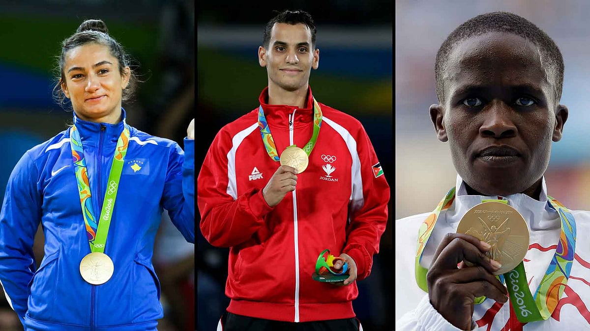 

Majlinda Kelmendi (L), Ahmad Abughaush (M) and Ruth Jebet (R). (Photo: AP)