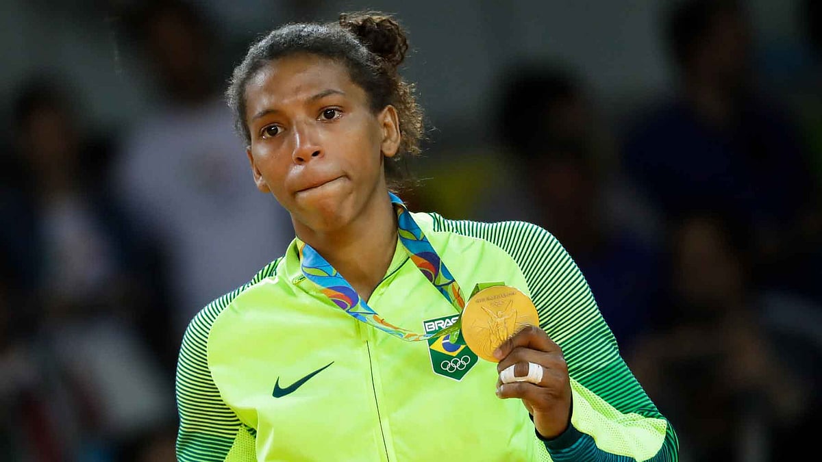 Rafaela Silva of Brazil reacts after winning her gold medal of the women’s 57 kg Jodo competition in Rio Olympics. (Photo: AP)