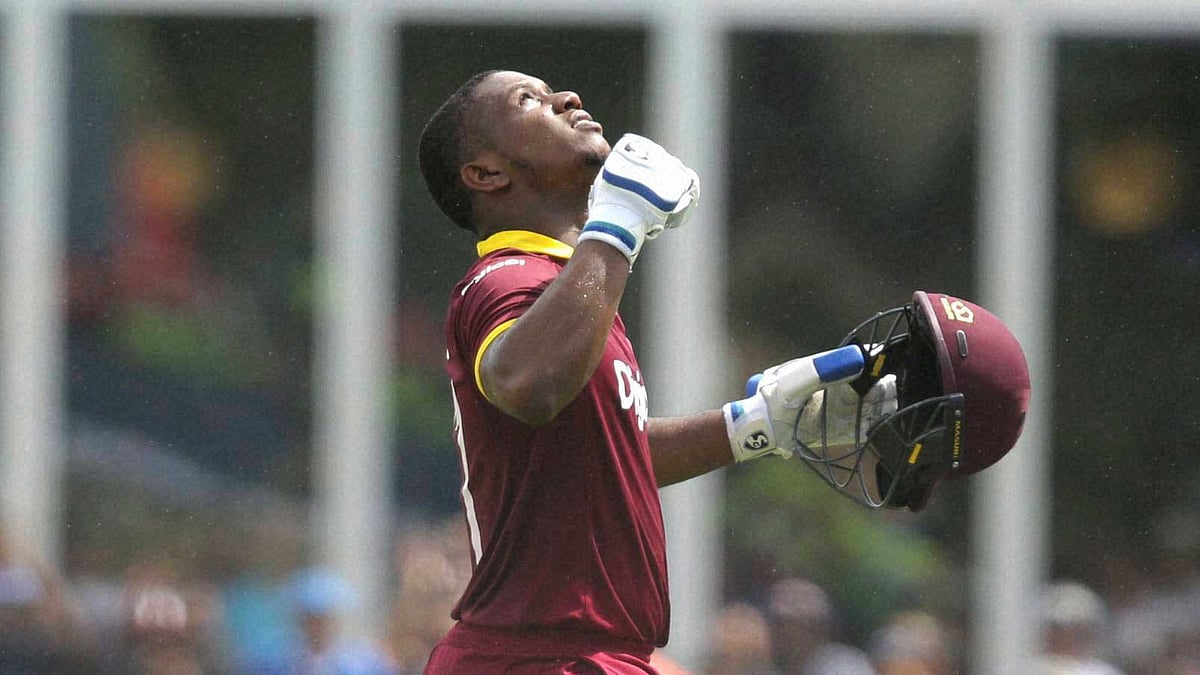 West Indies’ Evin Lewis reacts after scoring a century. (Photo: PTI)