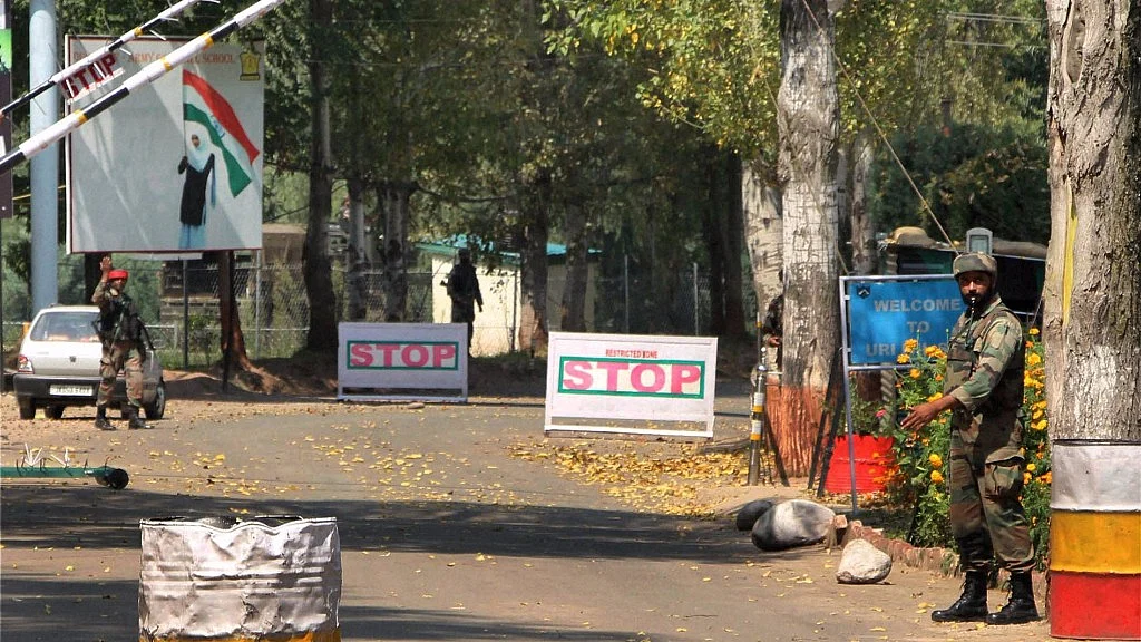 

Soldiers guard outside the army base which was attacked suspected militants in Uri, Jammu and Kashmir. (Photo: IANS)