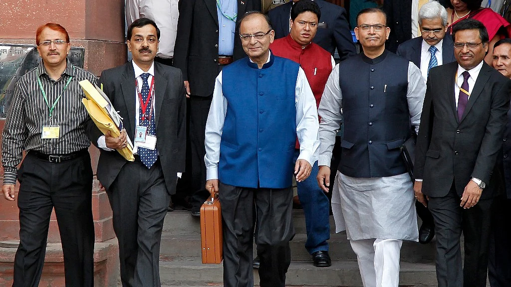 Finance minister Arun Jaitley (centre) and MoS Finance Jayant Sinha (second from right). (Photo: Reuters)
