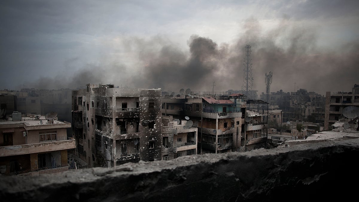 In a 2012 file photo, file photo, smoke rises over Saif Al Dawla district, in Aleppo, Syria. (Photo: AP)