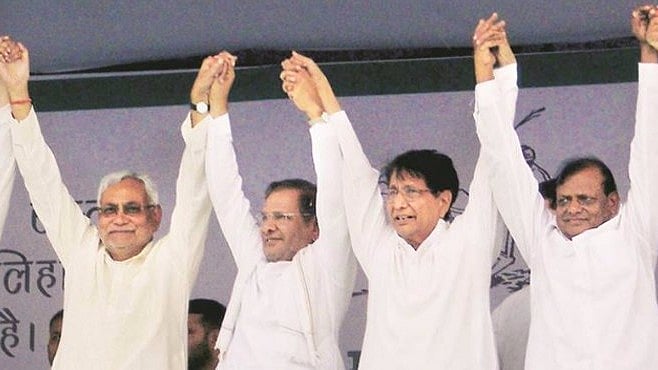 Nitish Kumar, Sharad Yadav and Ajit Singh at a rally in Baghpat on Tuesday. (File Photo: PTI) 