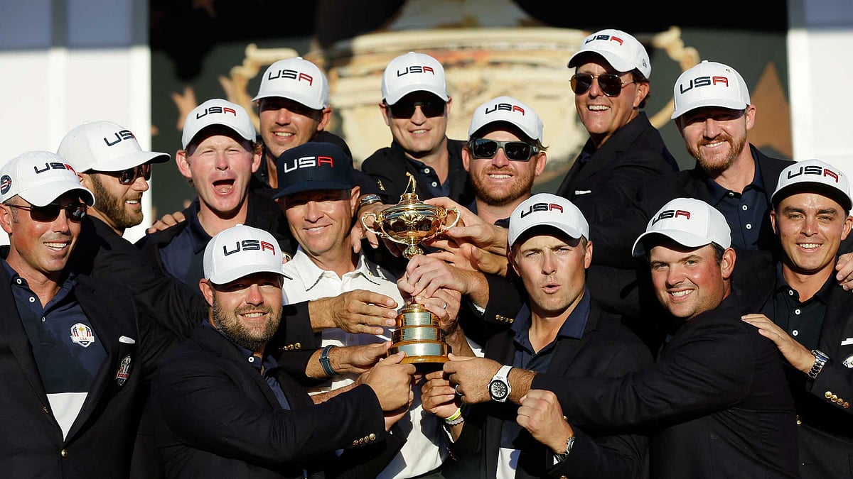 Members of the USA team pose for a picture during the closing ceremony of the Ryder Cup golf tournament. (Photo: AP)<a></a>