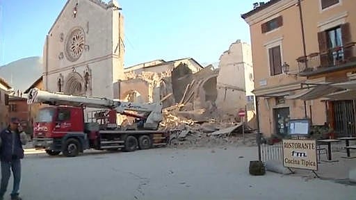 In this image made from video, a man stands in front of a damaged church in Norcia, Italy on 30 October 2016 after a powerful earthquake with a preliminary magnitude of 6.6. (Photo: AP)