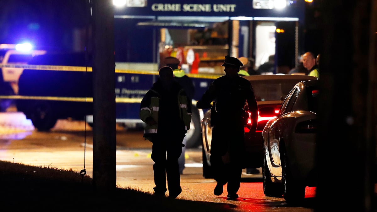 Police personnel at the scene of of one of the killings. (Photo: AP)