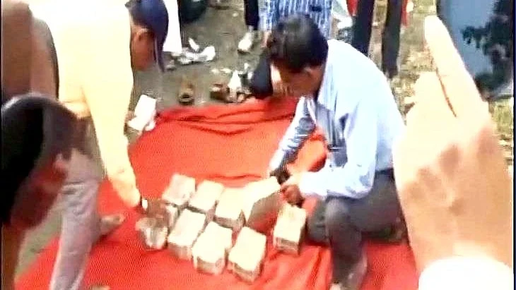 Rs 91.5 lakh cash seized from Maharashtra Cooperation Minister’s vehicle. (Photo: ANI)   