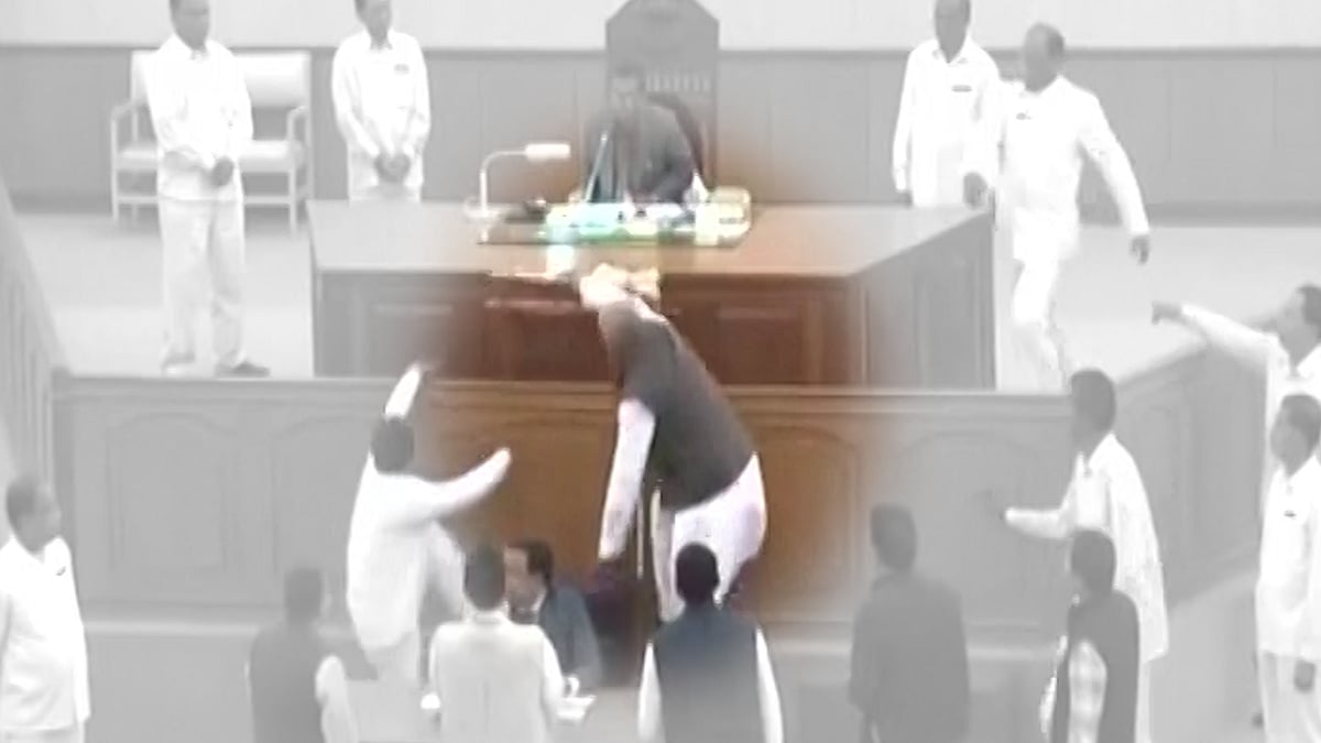 TMC MLA ran away with the Speaker’s mace. (Photo: ANI screengrab/altered by <b>The Quint</b>)