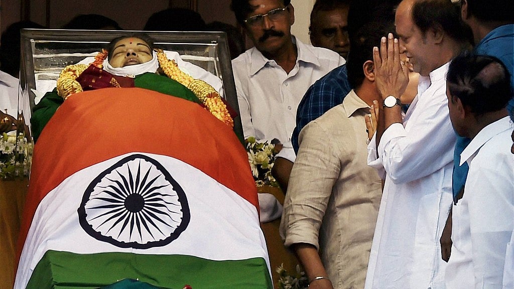 Actor Rajinikanth paying his last respects to AIADMK Supremo J Jayalalithaa, at Rajaji Hall in Chennai on Tuesday. (Photo: PTI)&nbsp;