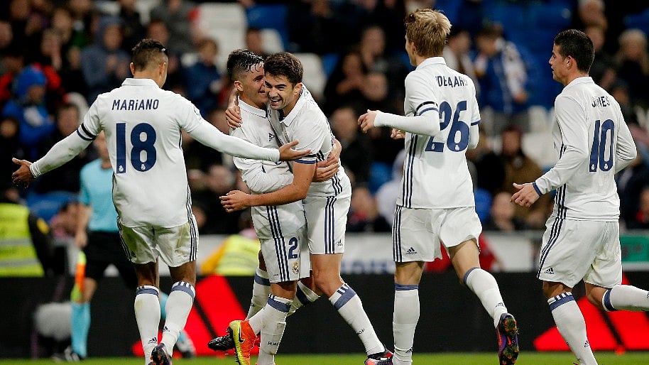 Real Madrid’s Enzo Zidane (centre) celebrates a goal with his teammates. (Photo: AP)