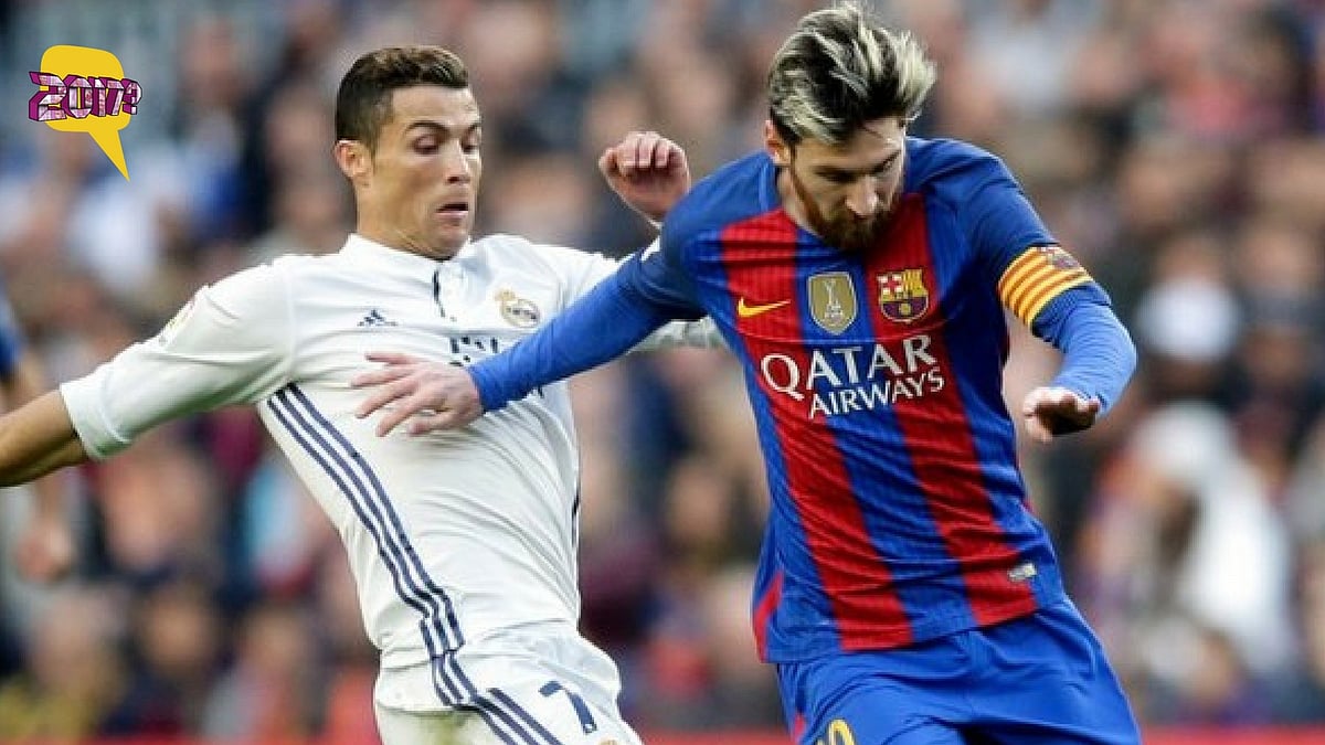 Barcelona’s Lionel Messi, center right, escapes Real Madrid’s Cristiano Ronaldo during a La Liga match. (Photo: AP)