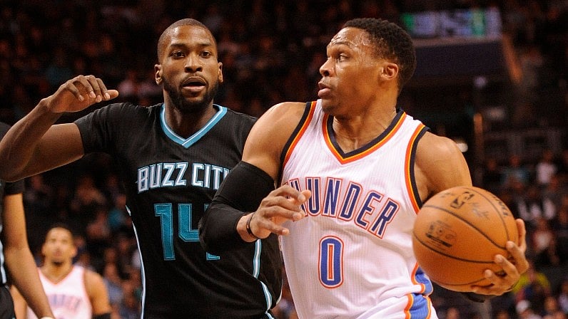 Oklahoma City Thunder guard Russell Westbrook (0) drives to the basket as he is defended by Charlotte Hornets forward Michael Kidd-Gilchrist (14) during the first half at the Spectrum Center. (Photo: Reuters)&nbsp;