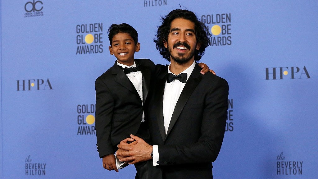 Sunny Pawar with Dev Patel. (Photo: Reuters)