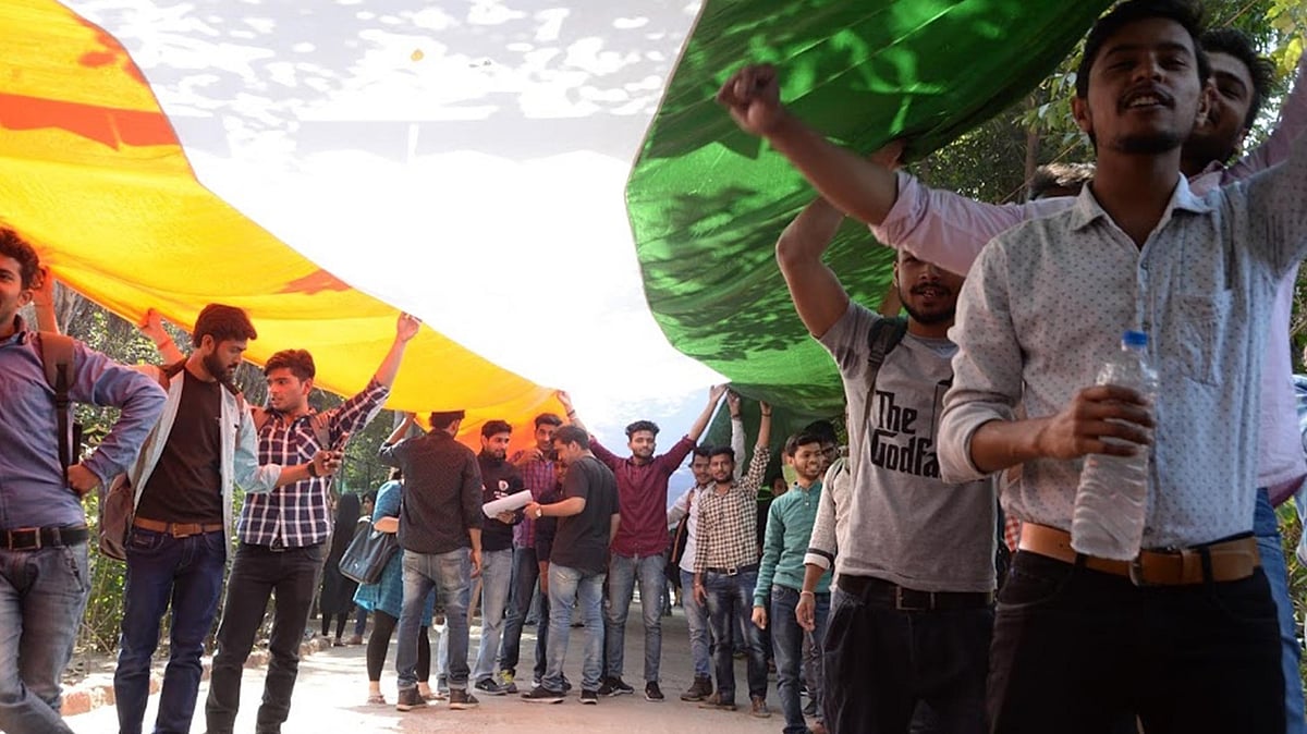 ABVP students hold a Tiranga march in DU’s North Campus on Monday. (Photo: IANS)