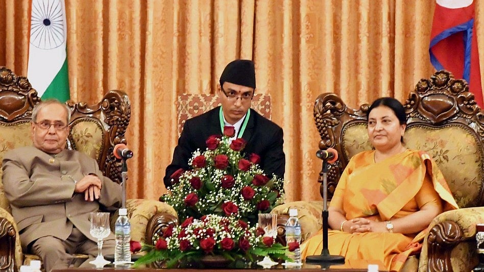 A file photo of Nepal President Bidya Devi Bhandari (right) and calls President Pranab Mukherjee in Kathmandu. (Photo: IANS)