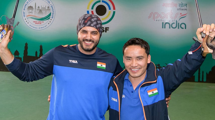 Amanpreet Singh (L) and Jitu Rai (R). (Photo Courtesy: <a href="https://twitter.com/ISSF_Shooting">Twitter/ISSF</a>)