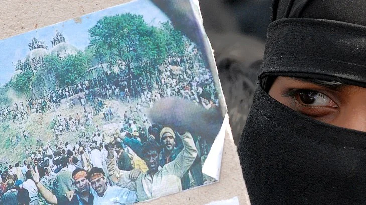 A veiled Muslim woman in 2009 attends a demonstration to observe the 17th anniversary of the razing of the Babri masjid.(Photo: Reuters)