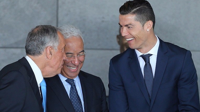 Portuguese president Marcelo Rebelo de Sousa, left and Portuguese Prime Minister Antonio Costa, second left speak with Real Madrid’s Cristiano Ronaldo at the Madeira international airport. (Photo: AP)