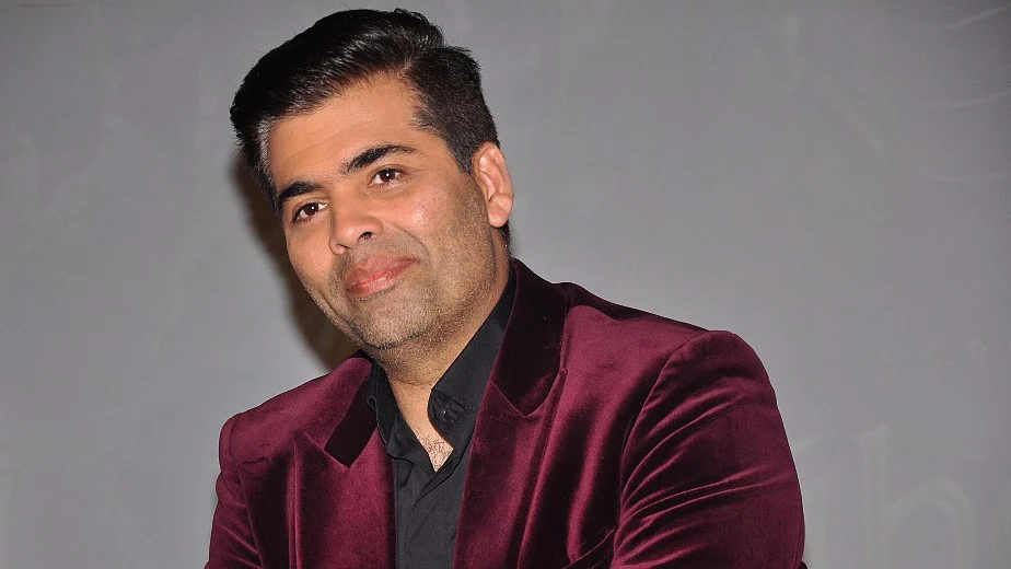 Karan Johar is now a father. (Photo courtesy:<a href="https://www.facebook.com/Pourfemmeindia/photos/p.1394333823957321/1394333823957321/?type=1&amp;opaqueCursor=AbrRNk8fMVDwlcHULaoPI-cFFgnRAHesUbHeXKz9FmiI0tUG5QgKgEnFYhKsII17bS6mekFTvYEvqpSSX1-lo0pRrLqhiy7XmU4cLXy-fiBrG2kNxQvfdY7U5nXW-44bFQFtfPICJ56mVjbCJhb55C2x9qYSbMR0bDSOXbXg1dNMD6zeIHJ-bzswpFzjCpsmPVeeDKgn4VOP6Kq3mkifYaTAJGJP-PnFEOr0P6mB3XVt3OvayvR6S_tYlvrLP73zvS_AtmL8l47Zr0v6zswmQqOeZA1PagQZ-pLQ9TiOSF_8FV628qa9KNOw0CSxqfk_krE8CDJejVgrXO-SG-F1wcbaP8ustfBQGy0_I8WetztmvRIYs9ijA5YMFI87XqNBKKQ&amp;theater"> Facebook/ pourfemmeinda</a>)