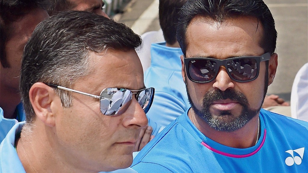 Leander Paes (R) with Indian Davis Cup team coach Zeeshan Ali during the draw ceremony for the tie against Uzbekistan, in Bengaluru on Thursday. (Photo: PTI)&nbsp;