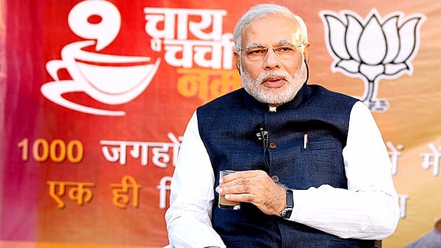 (Photo Courtesy: <a href="http://www.narendramodi.in/narendra-modi-the-people-of-india-a-cup-of-tea-grand-start-to-chai-pe-charcha-5964">narendramodi.in</a>)