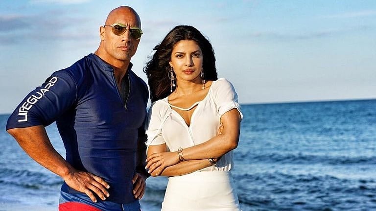 Dwayne Johnson and Priyanka Chopra in a scene from <i>Baywatch.</i> (Photo courtesy: Instagram/@PriyankaChopra)