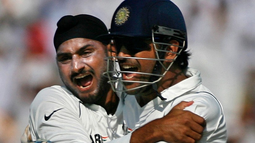 Harbhajan Singh (L) and MS Dhoni (R) celebrate a wicket during a Test match in 2008. (Photo: Reuters)