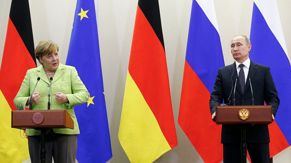 The body language of Putin and Merkel suggested tensions. (Photo: AP)
