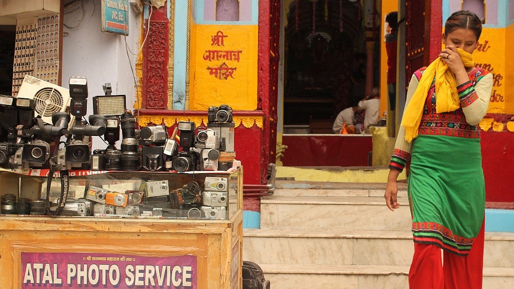 Camera parts on display outside a shop.