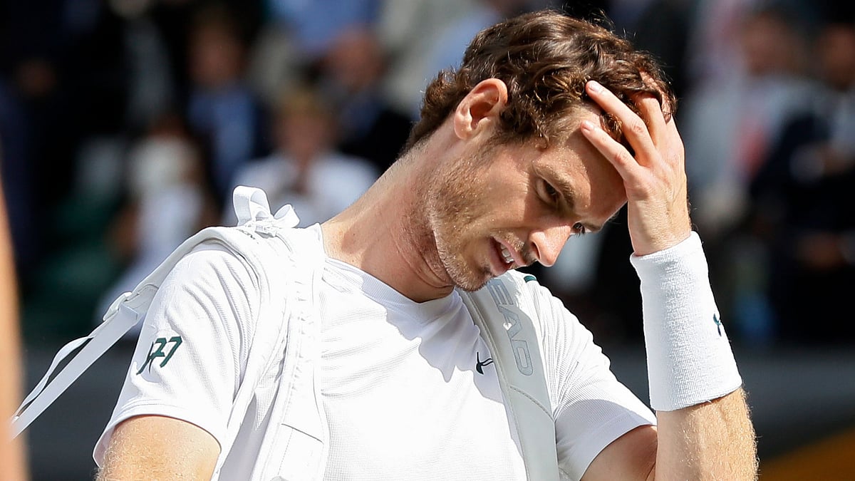 Andy Murray is dejected after crashing out of Wimbledon in the quarter-finals on Wednesday.