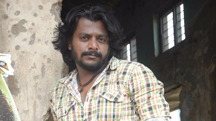 Kannada actor, Gururaj. 