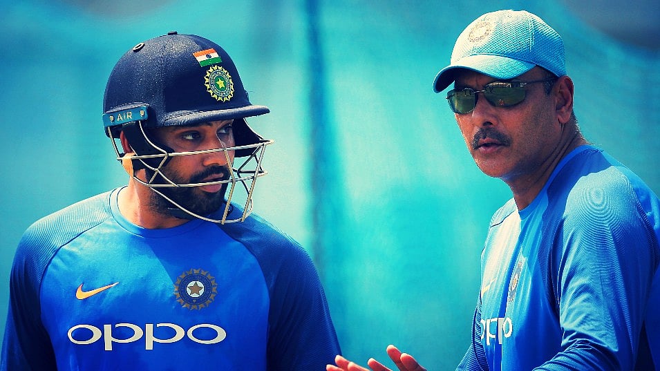 Rohit Sharma (Left), Ravi Shastri (Right).