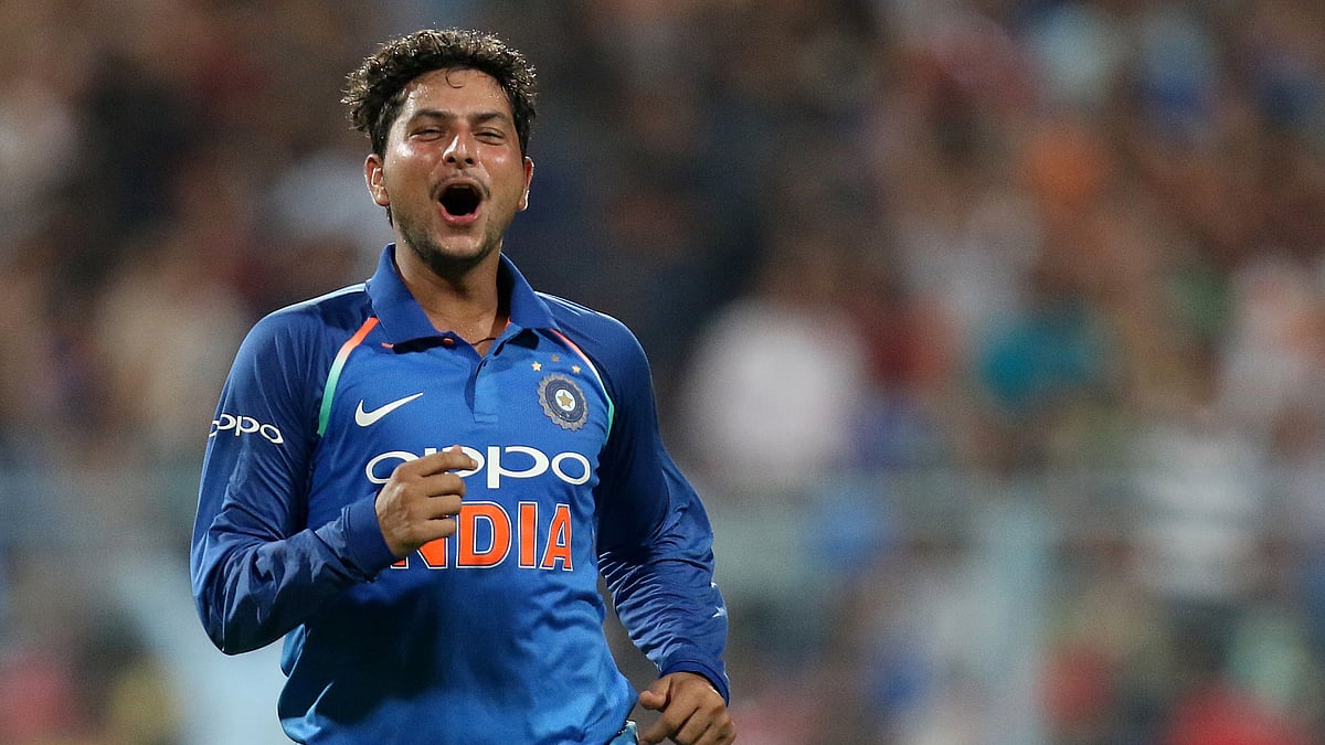 Kuldeep Yadav celebrates his hat-trick.