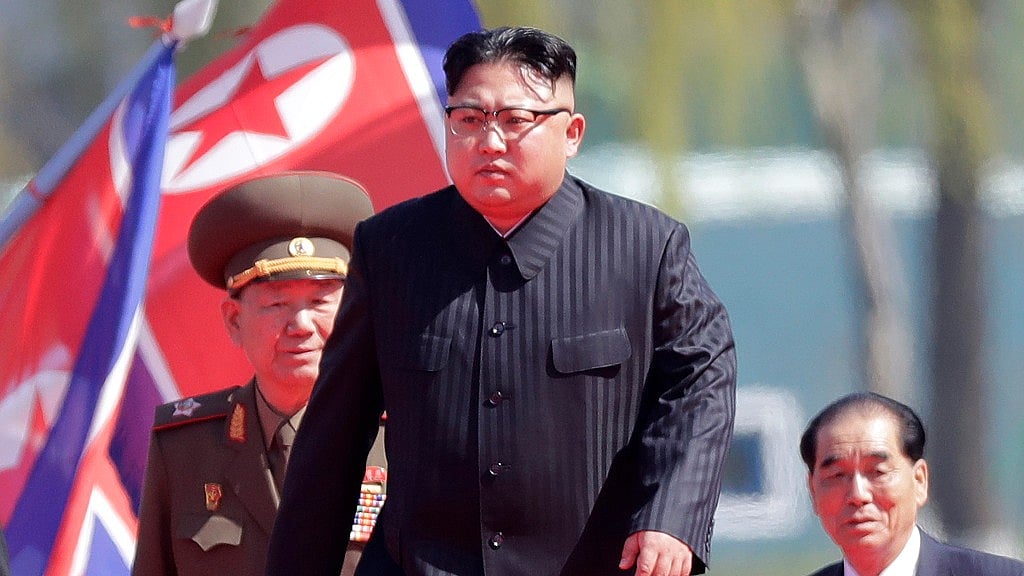 In this file photo dated April 13 2017, North Korean leader Kim Jong Un (centre) arrives for the official opening of the Ryomyong residential area, in Pyongyang, North Korea.<a></a>