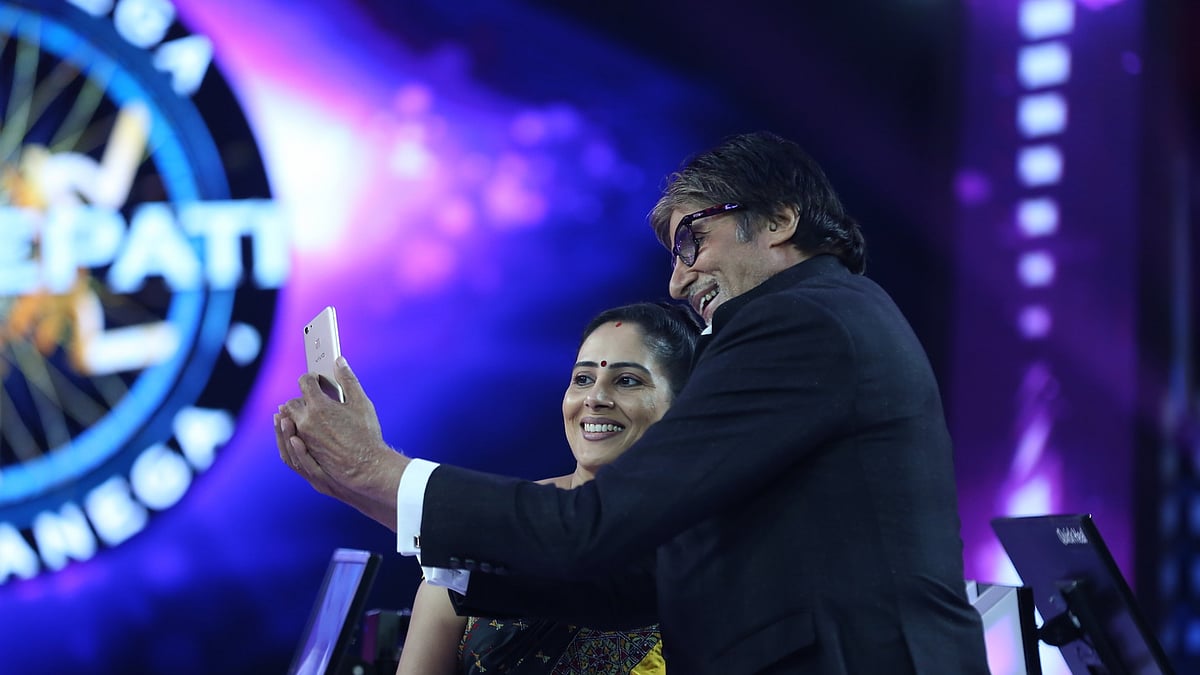 Anamika Majumdar takes a selfie with Amitabh Bachchan after her big win.