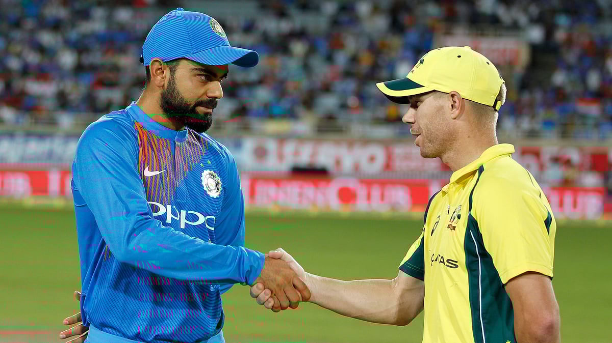 File photo of Virat Kohli (L) and David Warner (R).