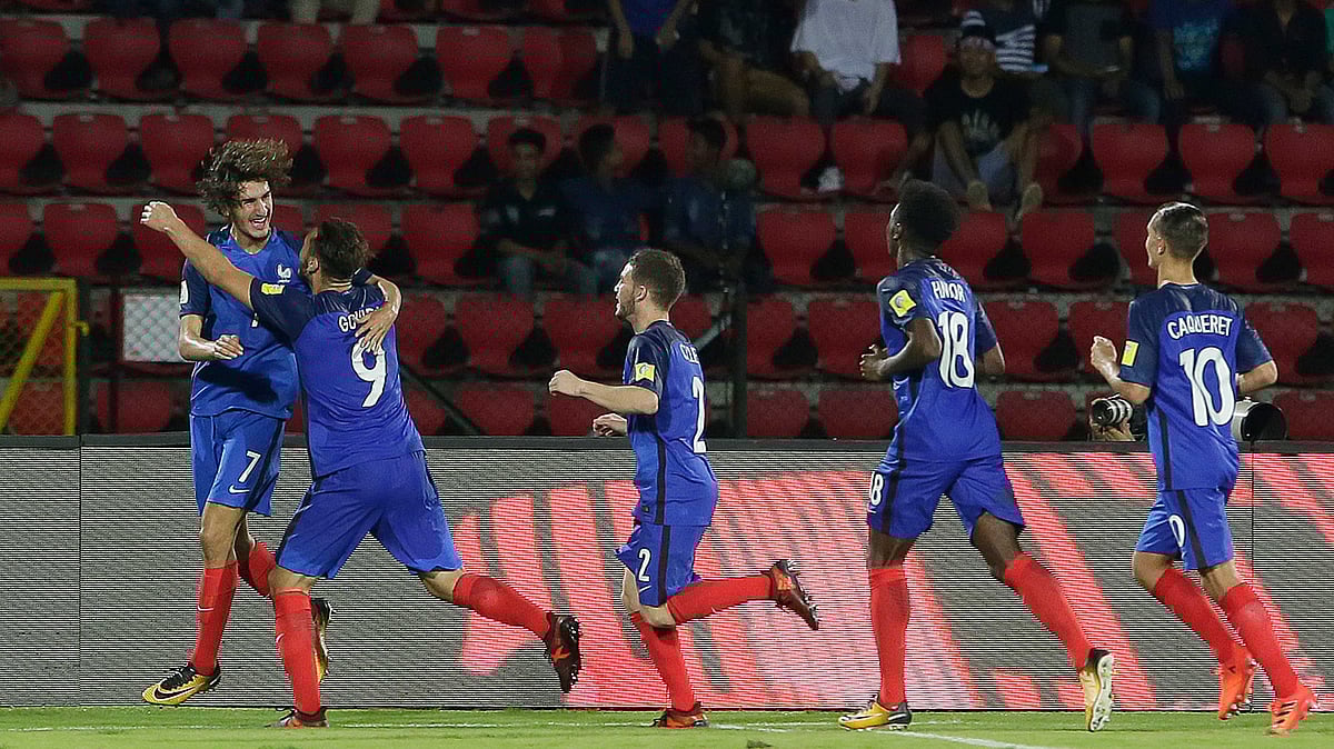 France’s soccer players celebrate after France’s Amine Gouri, 9, scored a goal during the FIFA U-17 World Cup match in Guwahati<a></a>