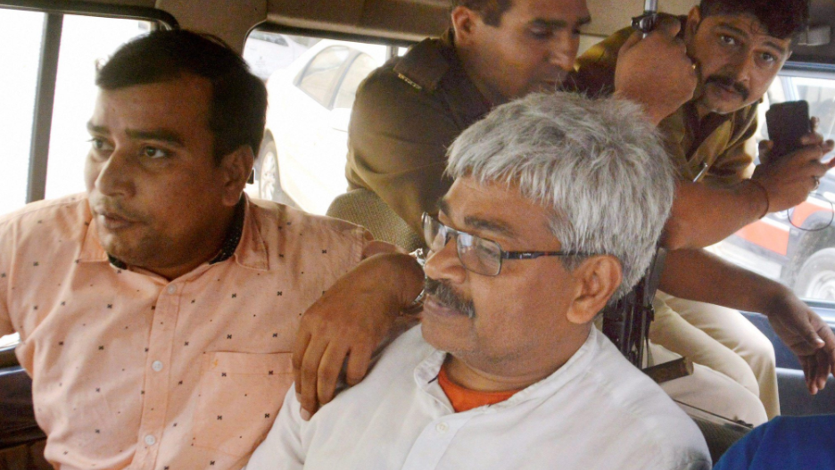 Senior journalist Vinod Verma (right) was arrested on 27 October.