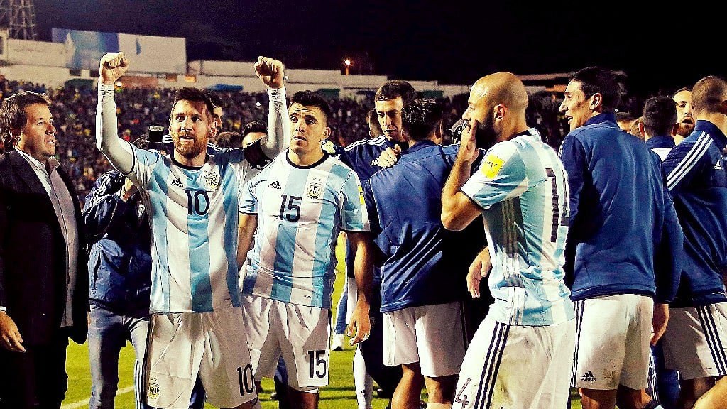 Argentina’s Lionel Messi, left, celebrates with his team after beating Ecuador during their 2018 World Cup qualifying soccer match at the Atahualpa Olympic Stadium in Quito, Ecuador.
