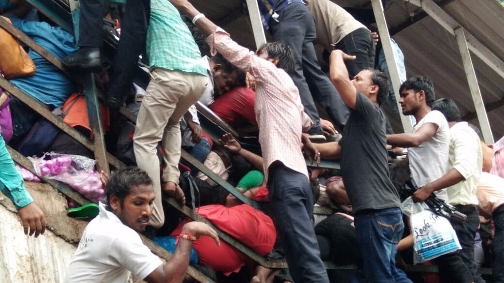 Stampede breaks out at Elphinstone station’s foot-over-bridge. 