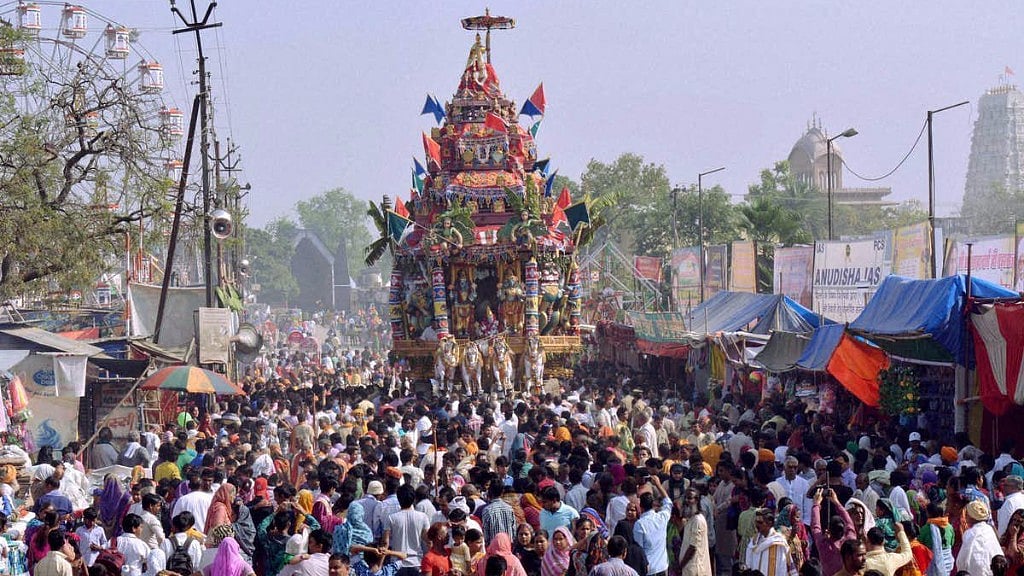 Devotees pull the chariot of Lord Rangnath during the Rath Ka Mela festival on the 9th day of Brahmotsava in Vrindavan.
