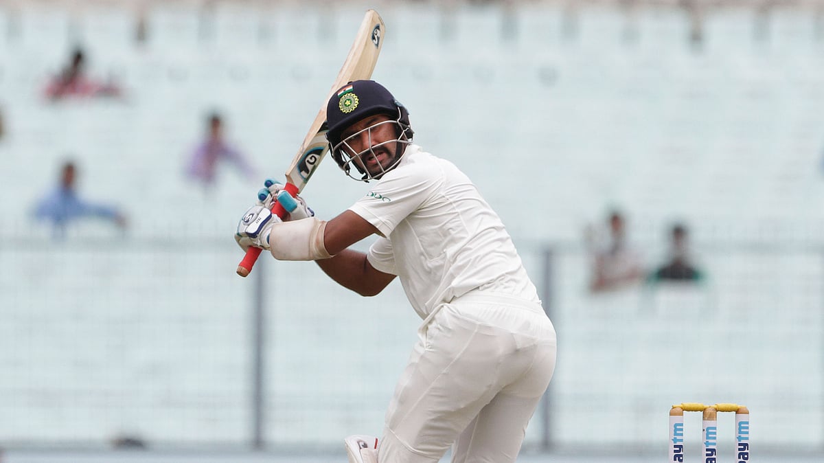 Cheteshwar Pujara is three runs short of a half-century in the Kolkata Test.