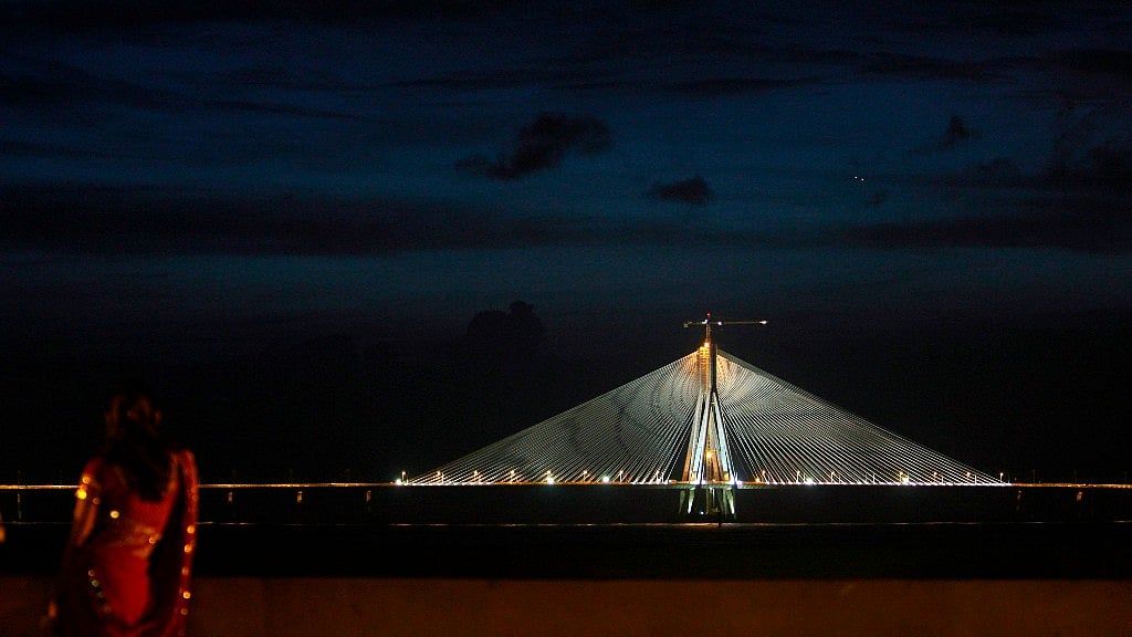 A woman looks at the Bandra-Worli Sea Link in Mumbai.